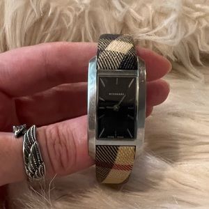 Women’s Burberry watch. Silver plated stainless steel. Strap type, Leather.